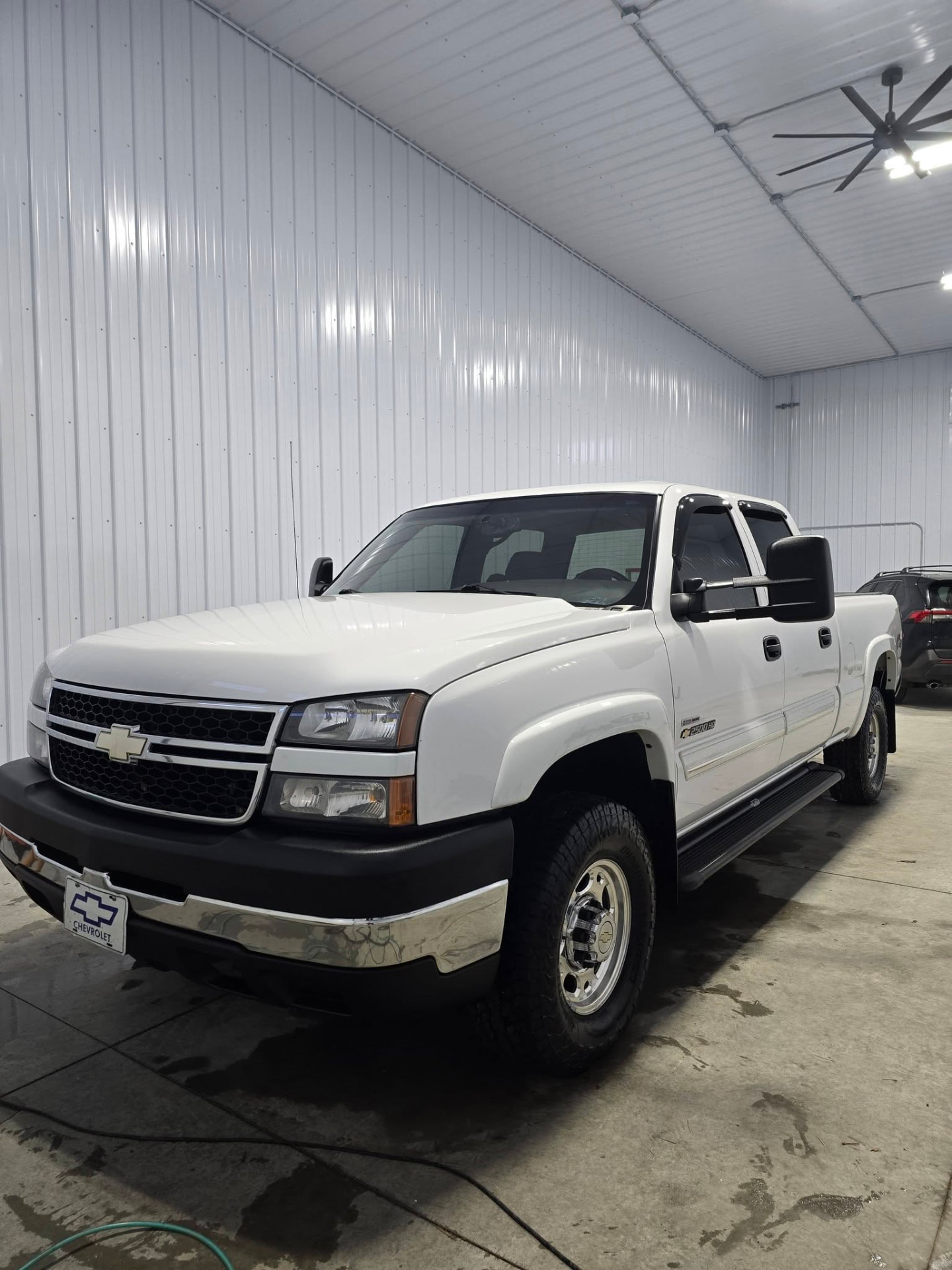 White Chevrolet Silverado 2500HD freshly detailed